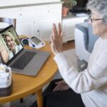 Woman at home on a virtual doctor visit, discussing the importance of consulting with a healthcare provider before starting Ozempic®, including reviewing medical history, determining the right dosage, and planning follow-up appointments for the best results.