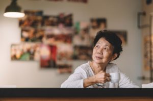 older woman wondering about if depression can cause memory loss